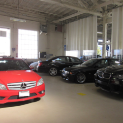 Red Mercedes in Auto Body Shop